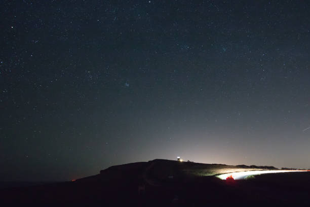 istock Belle Tout, Stars and Car Light Trails 929952600