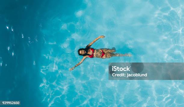 Woman Enjoying Swimming In A Pool Stock Photo - Download Image Now - Swimming Pool, Swimming, Aerial View