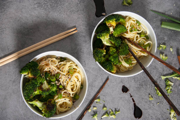 istock Delicious oriental food spaghetti with roasted broccoli. 929956090