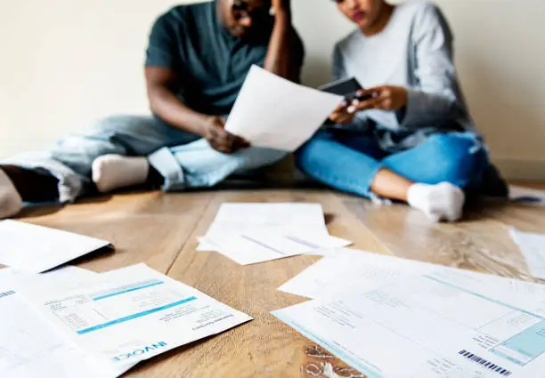 Couple managing the debt