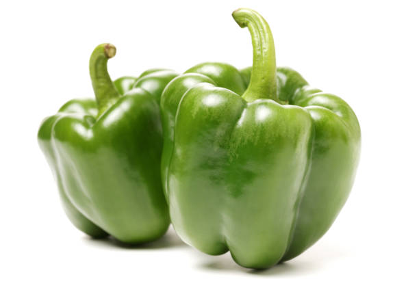 istock Green peppers separated on a white background 929964744