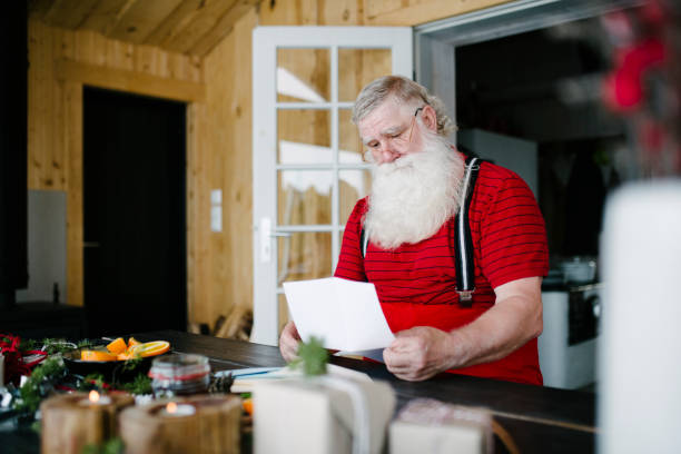 istock Santa Claus reading children's letters 929997152