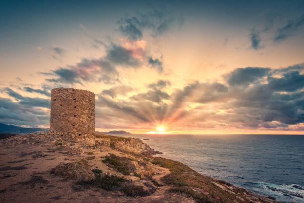 istock Dramatic sunset at Punta Spanu on the coast of Corsica 929998754