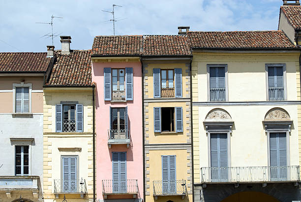 Lodi - Ancient colorful houses Lodi (Lombardy, Italy) - Exterior of ancient colorful houses in the Cathedral Square lodi italy stock pictures, royalty-free photos & images