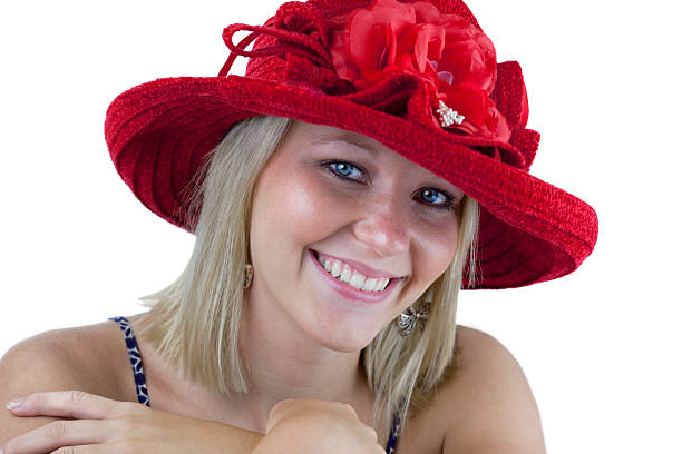 istock Beautiful smiling blonde in red hat isolated on white 93000293