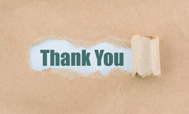 istock Letter Thank You Written Behind Torn Paper 930003538