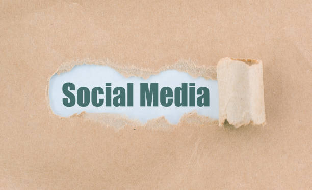 istock Letter Social Media Written Behind Torn Paper 930003554