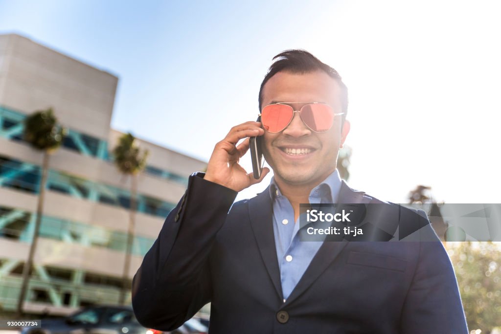 Businessman in town Portrait of a businessman in city of Los Angeles. Adult Stock Photo