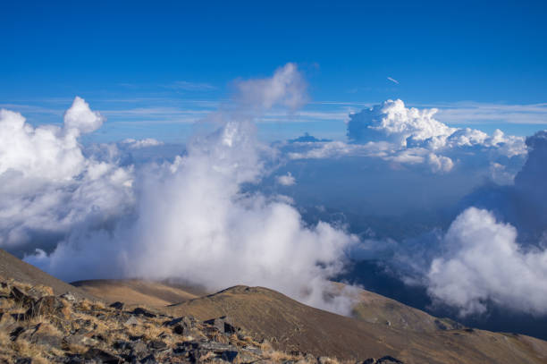 istock Standing above the clouds on the peak of Puigmal 930014526