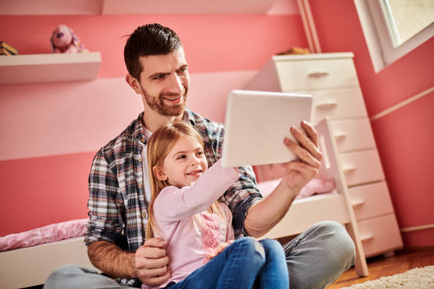 istock Father and daughter 930023386