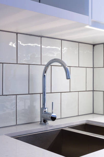 istock Close up of modern kitchen faucet and sink 930026254