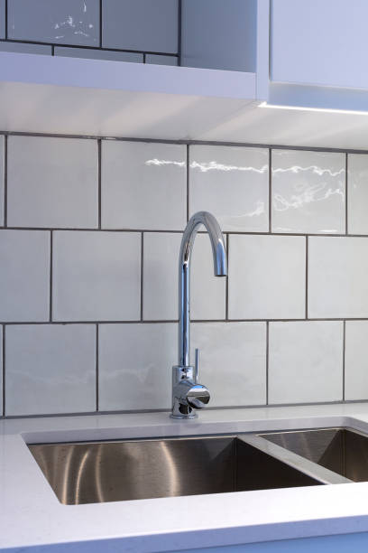 istock Close up of modern kitchen faucet and sink 930026738