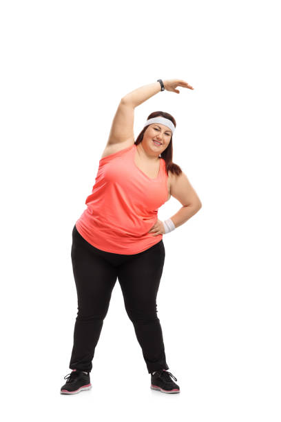 istock Overweight woman exercising 930026926
