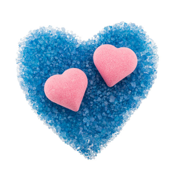 istock Composition of heart-shaped bath bombs and scattered blue bath salt 930030196