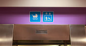 access for stroller and disabled sign over a lift door