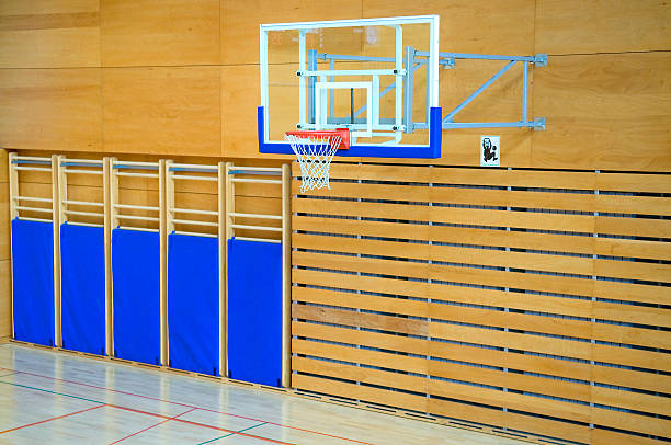 istock Basket Backboard and Exercise Mats on Wooden Wall 93004258