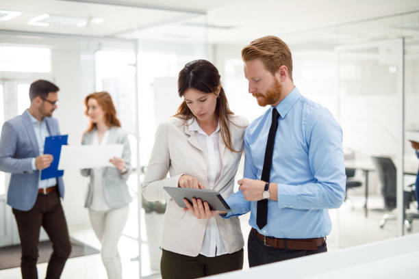 istock Teamwork and technology - Invaluable to modern business 930047734