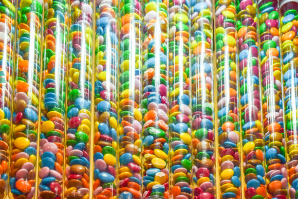 istock Colourful pink sweets in tubes 930049900