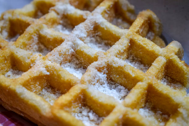 istock Close up waffle with powdered sugar, Camden, London, UK 930050480