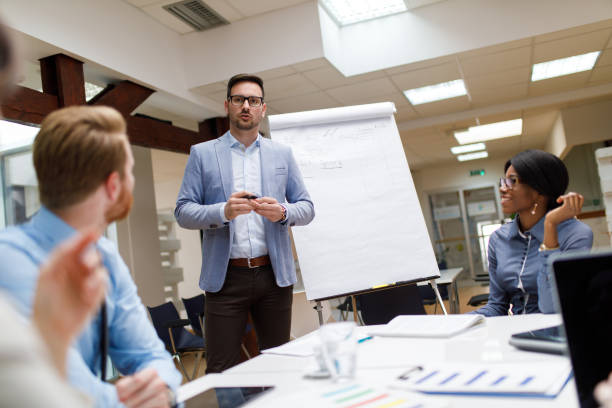 istock Businessman is presenting new project to partners in the office 930063680