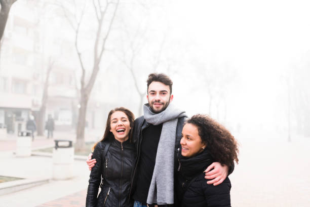 istock Team members walking and laughing on the street 930067314