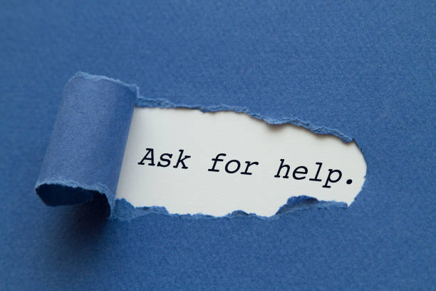 Ask for help Ask for help written under torn paper. help single word stock pictures, royalty-free photos & images