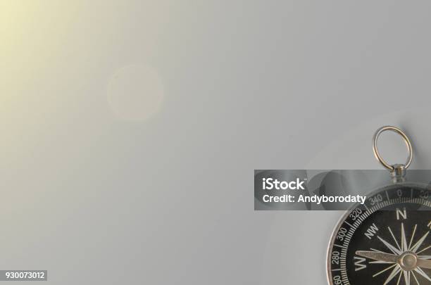 Compass On Gray Background Stock Photo - Download Image Now - Honesty, Navigational Compass, North