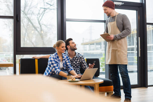 istock Cheerful young people ordering food 930081870