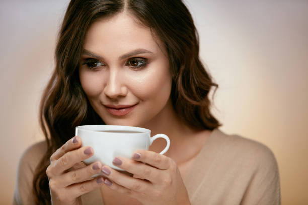 istock Woman Drinking Coffee. Female Drinking Hot Beverage. 930095662