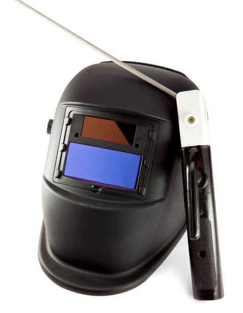 istock Protective welder mask, electrode and gloves on a white background 930096200