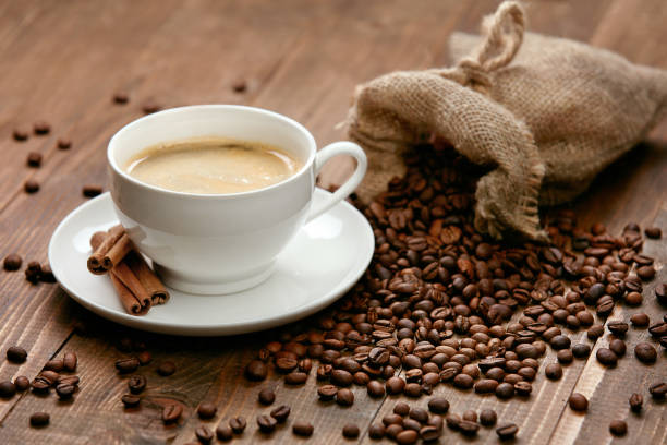 istock Cup Of Coffee. Hot Drink And Beans On Table. 930098698