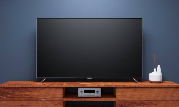 black smart tv mockup su console in legno - television stand foto e immagini stock