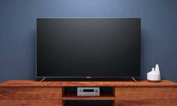 Photo of Black Smart Tv Mockup on wooden console