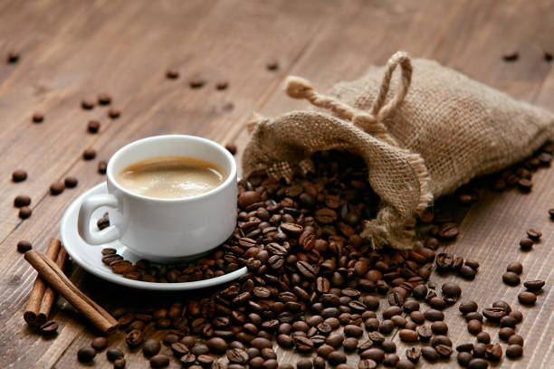 istock Cup Of Coffee. Hot Drink And Beans On Table. 930099318