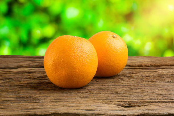 istock Still Life Fresh Orange Fruit on Vintage grunge Wooden Table 930099334