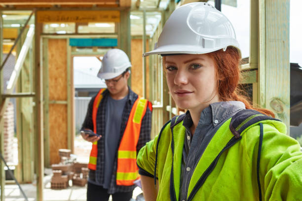 istock Portrait of female construction worker at site 930099390