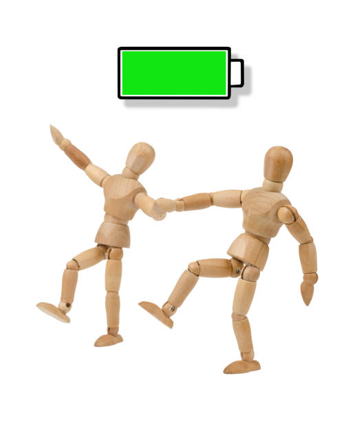 istock Wooden mannequin with full energy, battery - dancing with partner 930099672