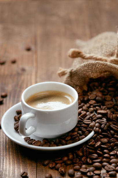 istock Cup Of Coffee. Hot Drink And Beans On Table. 930100148