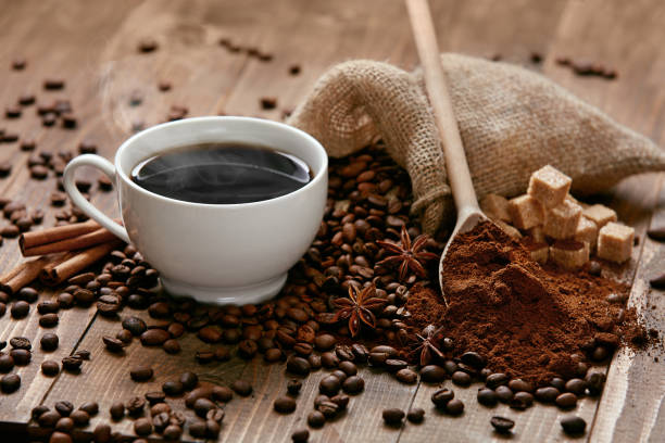 istock Cup Of Coffee And Coffee Beans On Table. 930100238