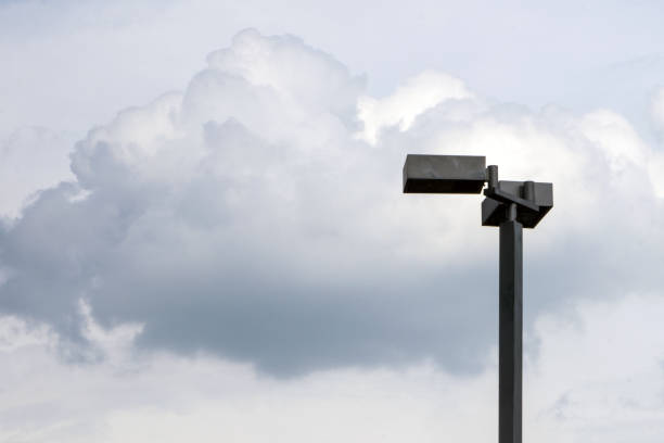 istock Lamp post electricity industry with sky background. Spotlight tower. street lamp. modern light pole., with copy space fot text. 930134572