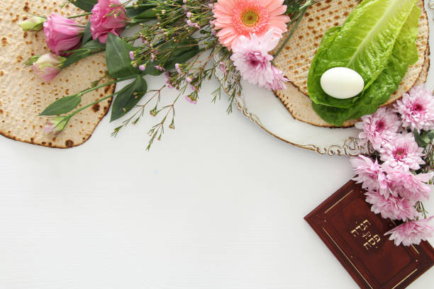 istock Pesah celebration concept (jewish Passover holiday). Traditional book with text in hebrew: Passover Haggadah (Passover Tale). 930134850