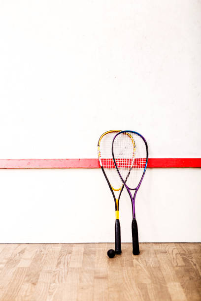 istock Squash racket and ball on the court 930143234