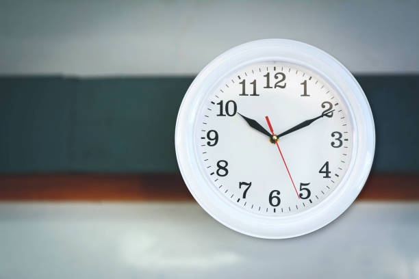 istock A watch on  wall with copy space on blur background 930147974