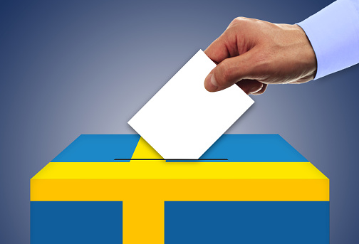 Man voting on elections in Sweden