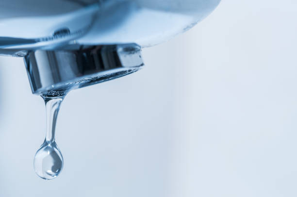 istock Tap and water drop close up 930154794