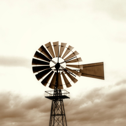 old american windmill, in grainy sepia retro-style