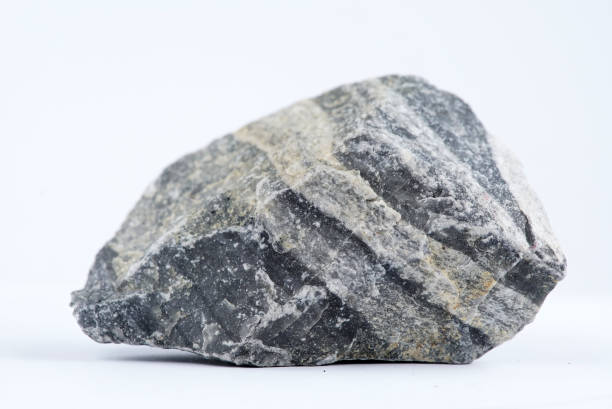 Granite Rock Sample of granite rock isolated on white. igneous rock stock pictures, royalty-free photos & images