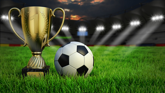 Ball with trophy cup on gras in soccer stadium with illumination at night, 3D rendering