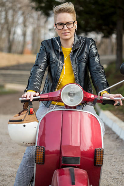 istock girl in the Vespa 930182704