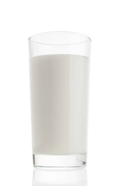 istock Milk glass closeup isolated on white background 930192438